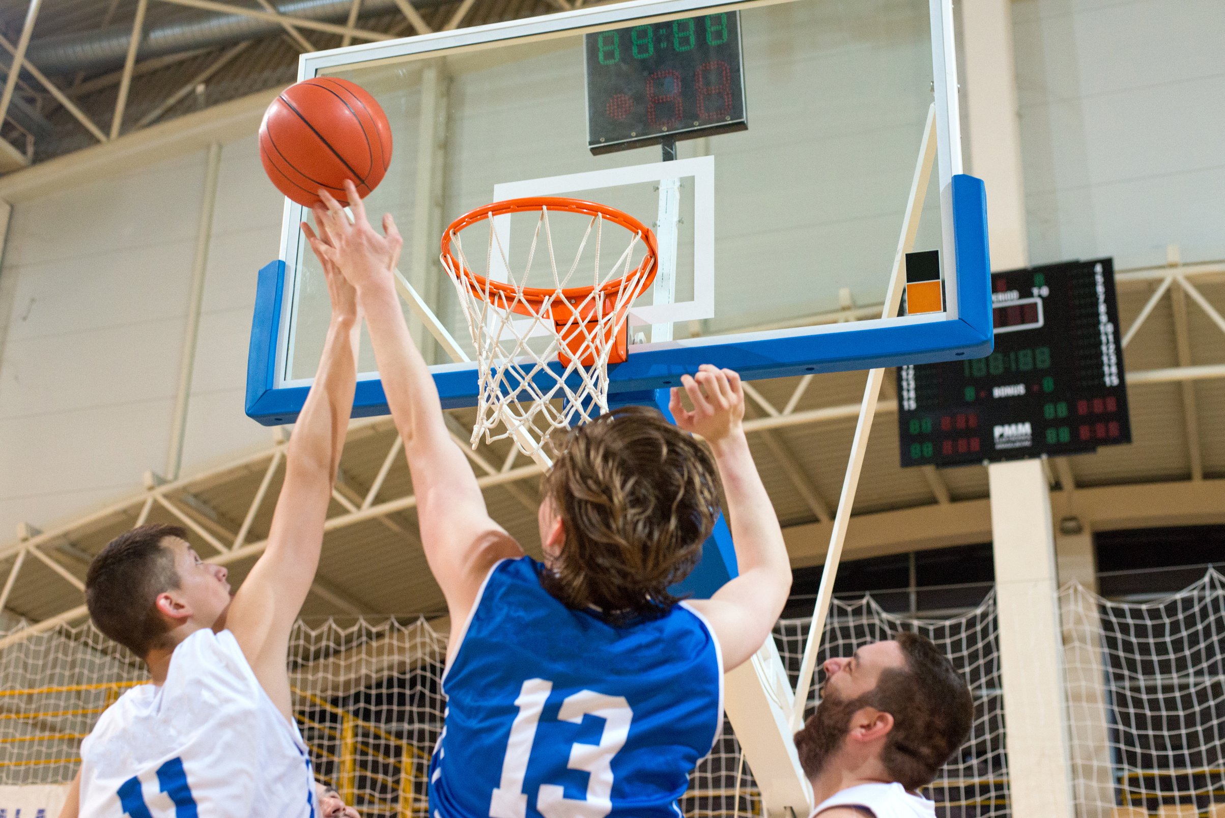 Basketball players playing basketball